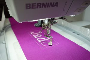 Flatlock Patchwork Trick-or-Treat Bag - BERNINA 790PLUS embroidery machine embroidering alphabet
