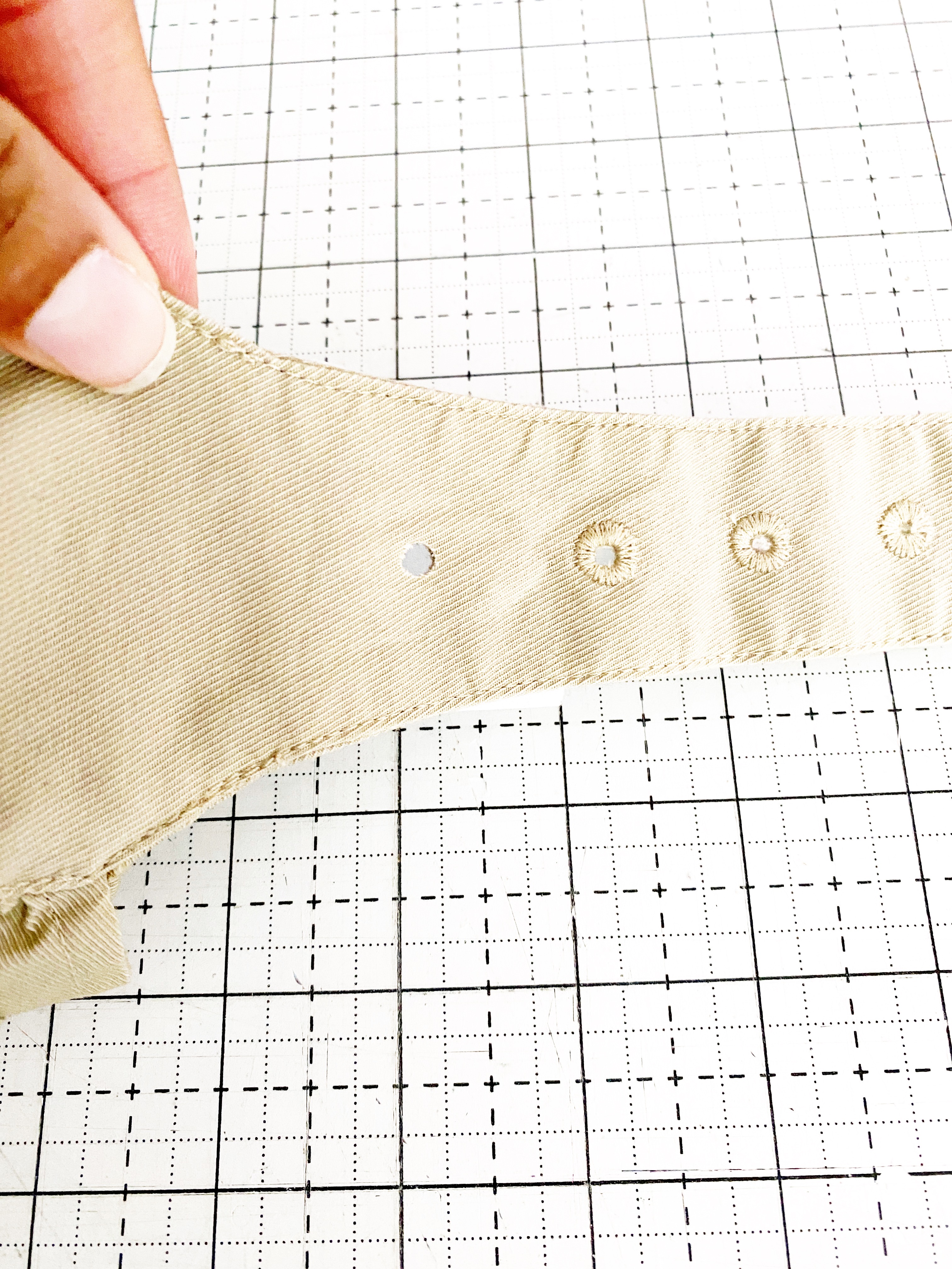 A Step by Step Tutorial On How To Put Eyelets In Fabric - The