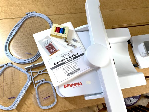 Sample packages of embroidery thread, embroidery needles, and a variety of stabilizers to get started with embroidery.