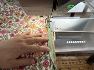 Completing the binding for the Nona Quilt Along BERNINA WeAll Sew blog