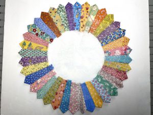 The 36 wedges stitched together to create a flat Dresden block ready to appliqué.