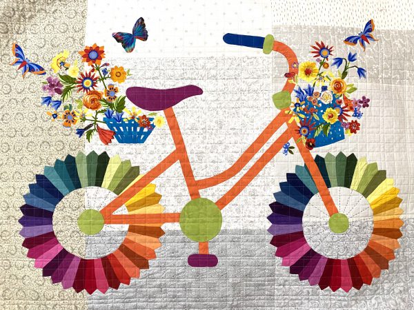 Modern take on a traditional block with Cherrywood fabrics and Whimsical Bicycle Pattern