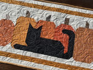 Close up of The Onyx in Autumn Table Runner