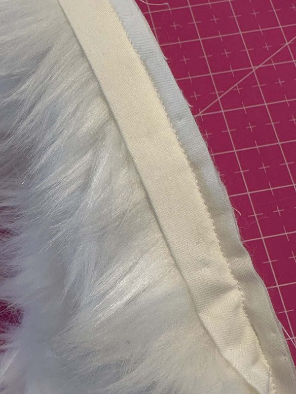 Couched Christmas Stocking- Adding fabric to hem the faux fur trim