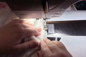 Couched Christmas Stocking- Hemming the faux fur trim