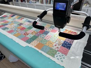 Q24 and the quilted mat cover top