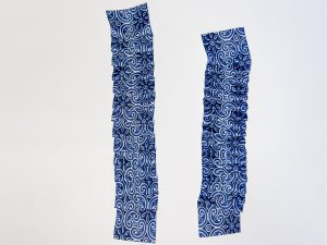 Two dark blue ribbons in different lengths