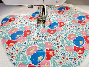 Crosshatch pattern on colorful bib