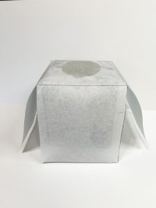 pattern pieces shaped into a box.