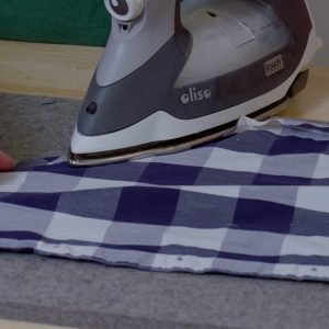 Shirt edge on ironing board