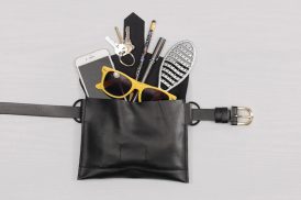 Leather bag with various accessories inside