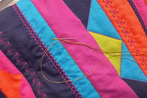 Straight Line Quilting Part 3- Whipped Straight Stitch in process