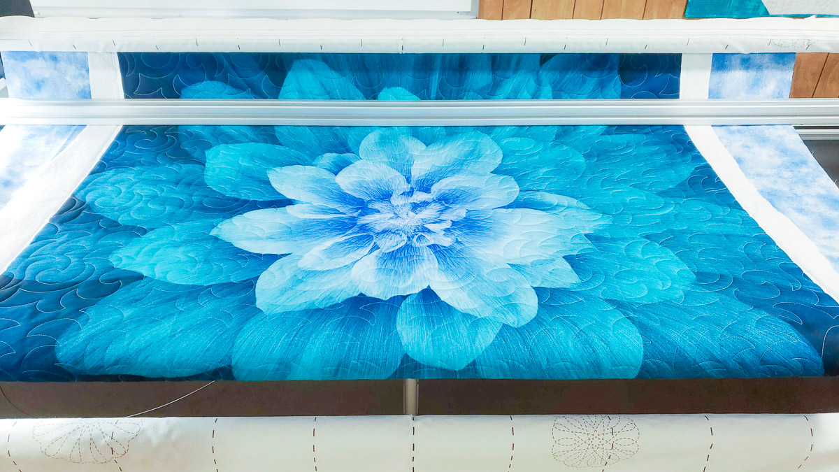 quilting on a blue flower panel