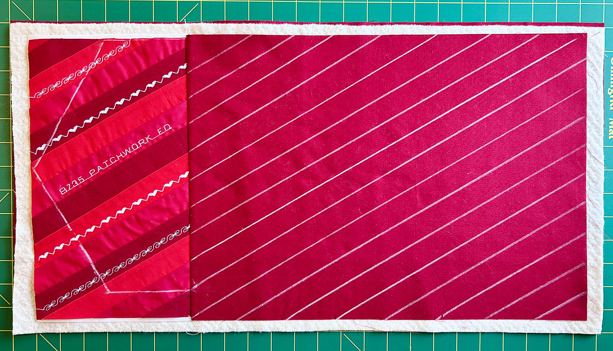 chalk lines marked on red fabric