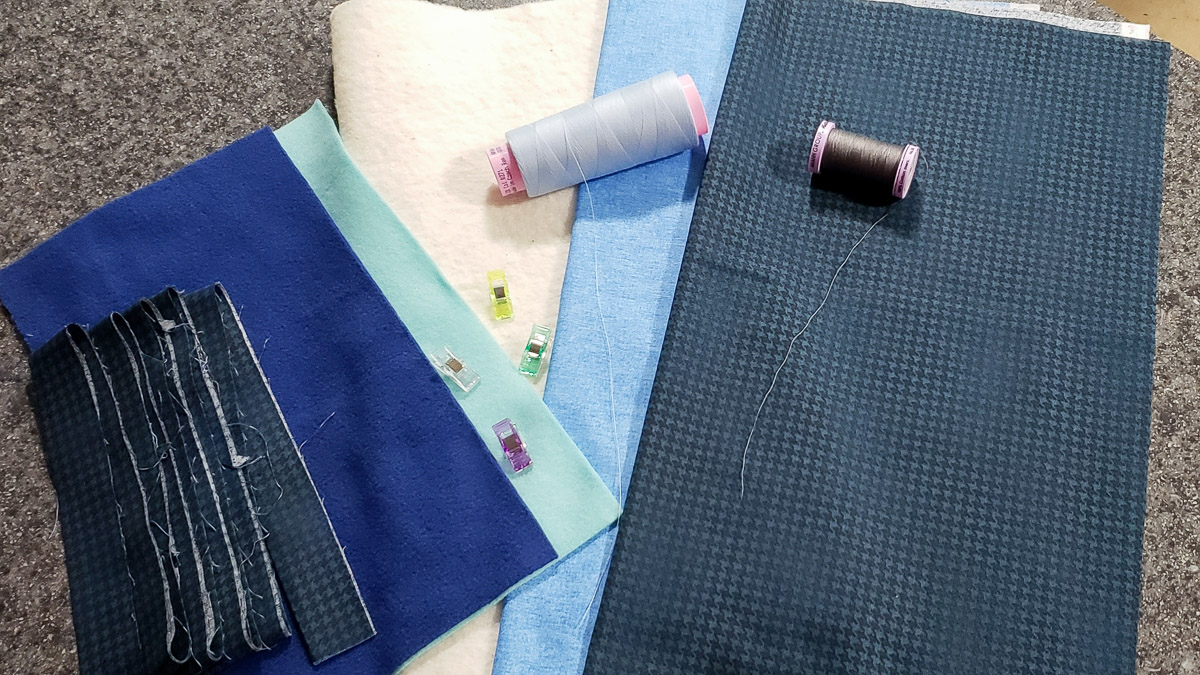 collection of fabric and materials for sewing