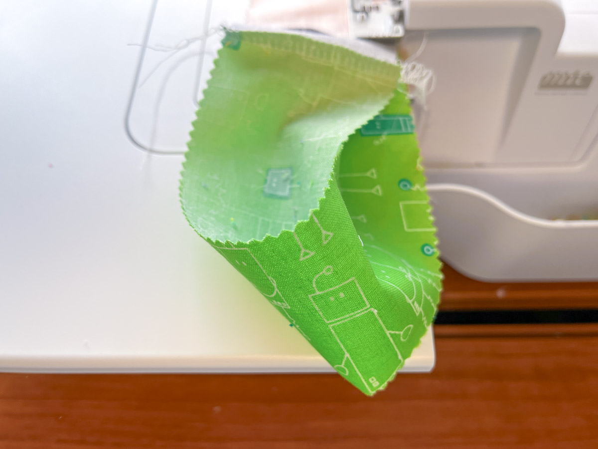 loop at the end of green fabric strip