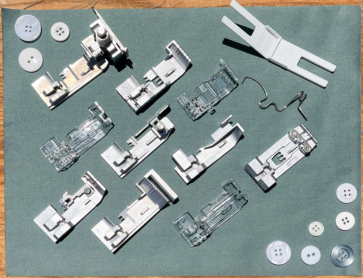 BERNINA Overlocker feet and buttons arranged on pretreated fabric