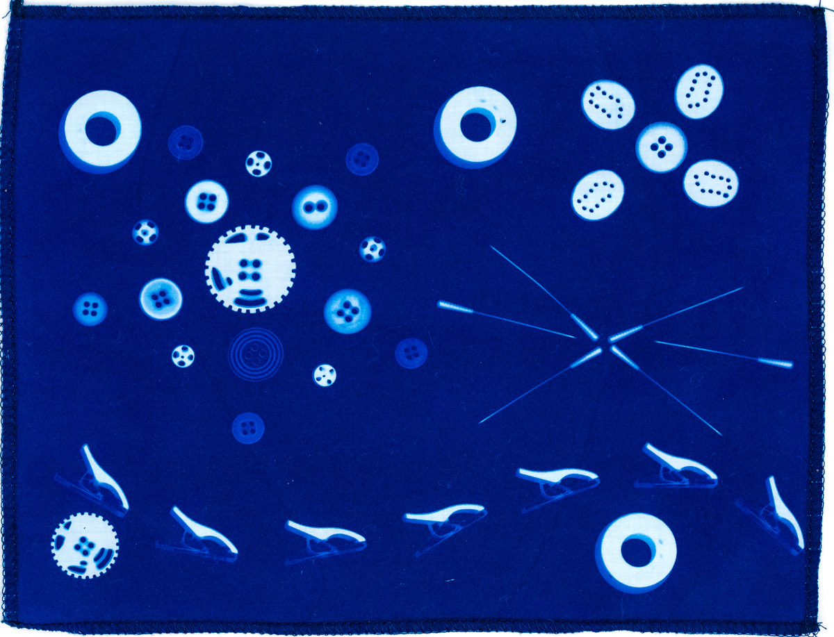 Sewing notions final result showcasing white imprints on a brilliant blue fabric