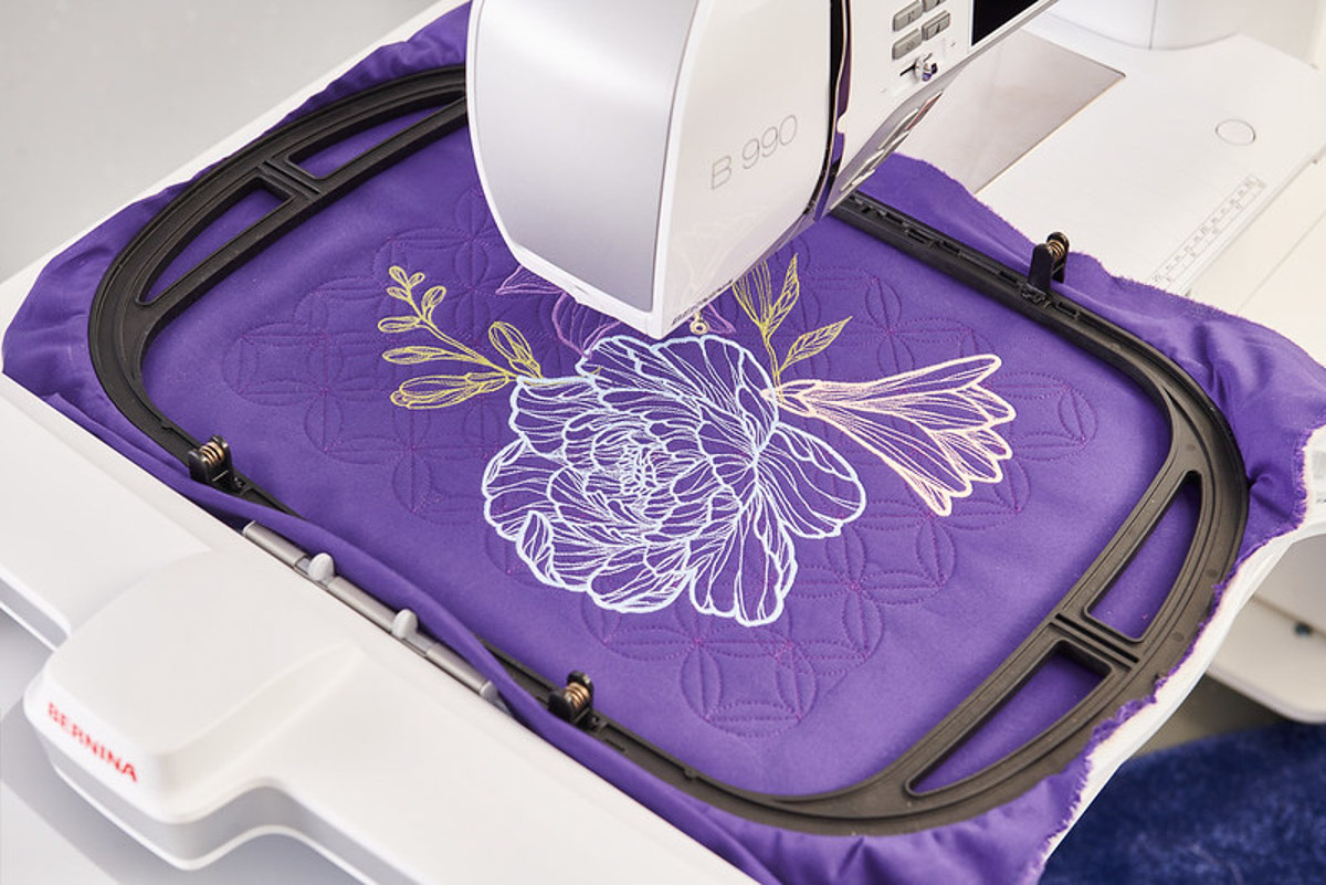 Embroidery on purple fabric