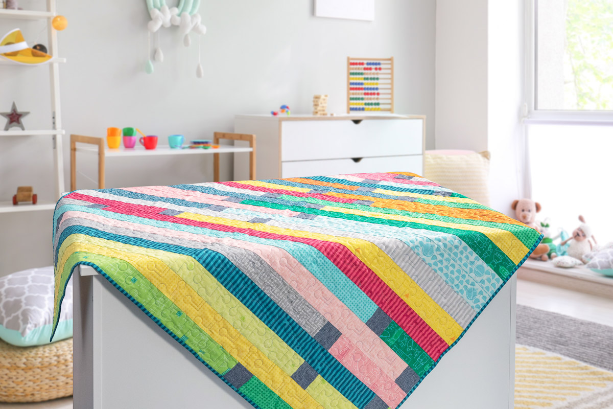 Colorful jelly roll quilt tutorial