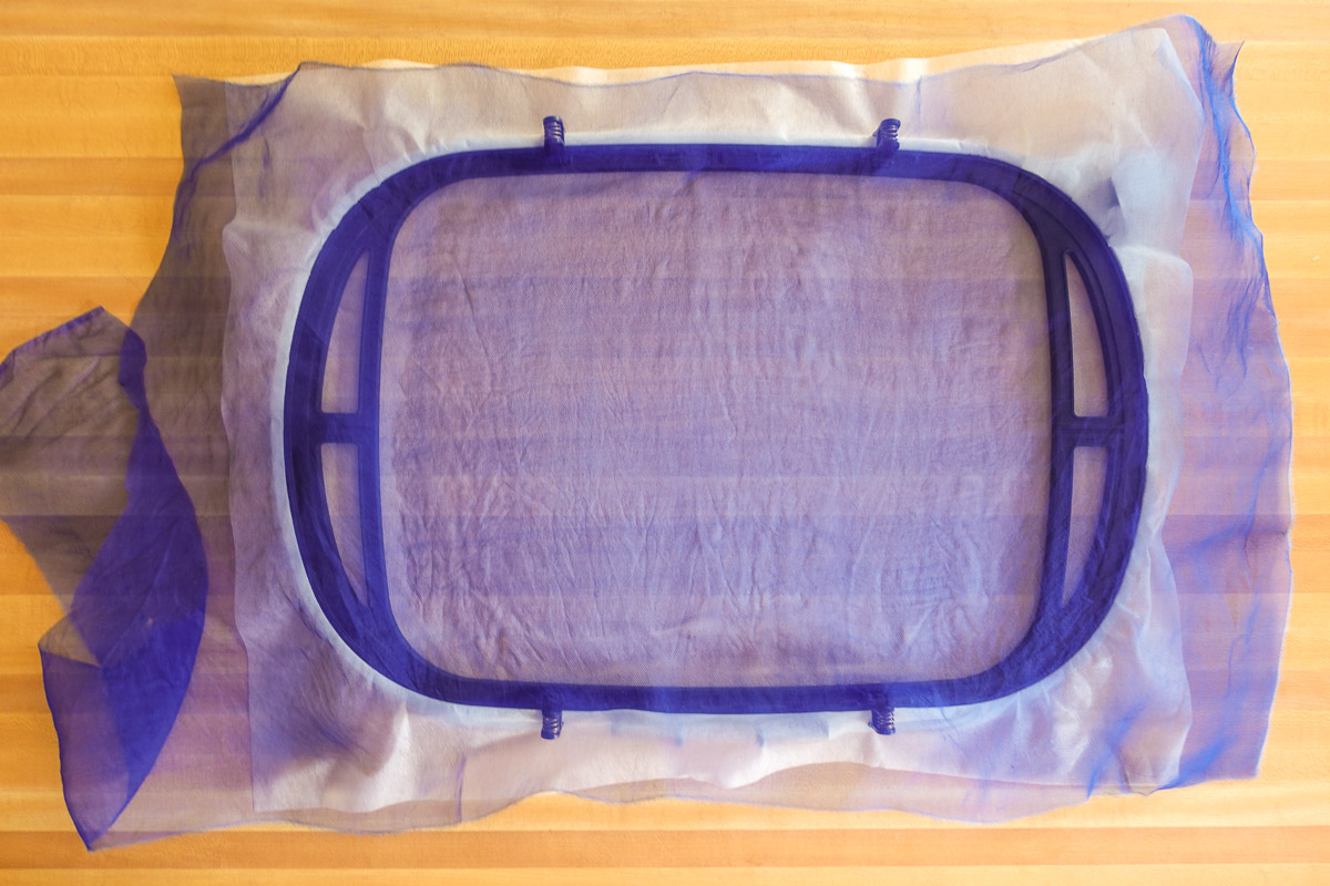 Purple organza placed on stablizer