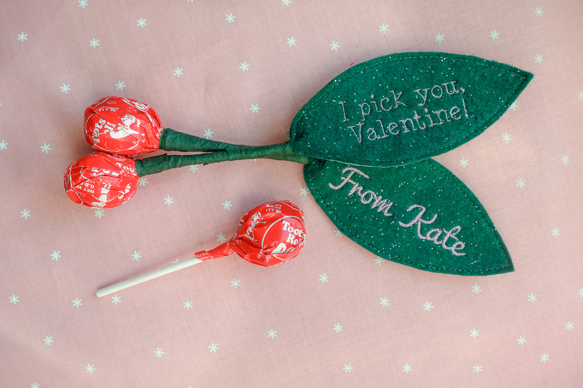 Red tootsie pop and a cherry valentine