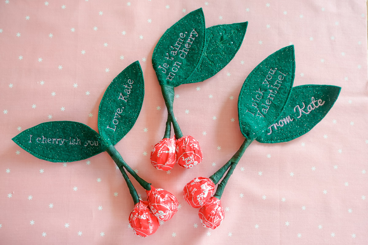 Arrangement of three finished machine embroidered cherry valentines