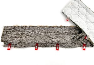 Second long side of main and lining fabric clipped