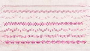 Rows of decorative stitches with twin needle on fabric