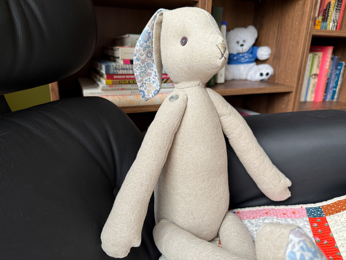 Flora Lapin rabbit sewn and propped up on chair