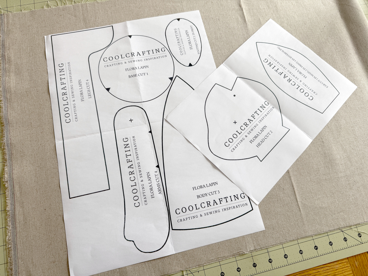 pattern pieces arranged on cream linen
