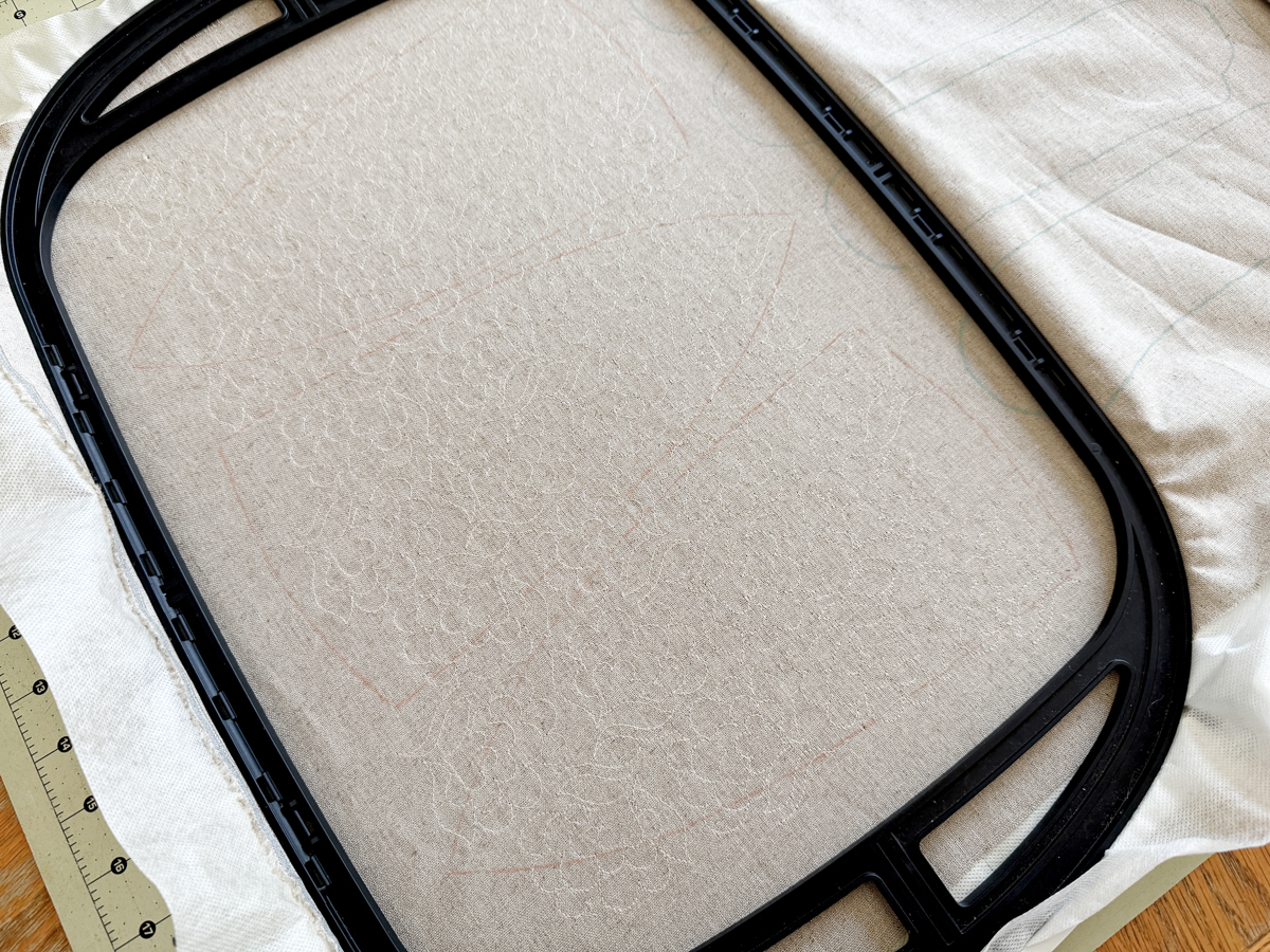 Re-hooping fabric for the embroidered Flora Lapin fabric on the Giant Hoop with the B 990