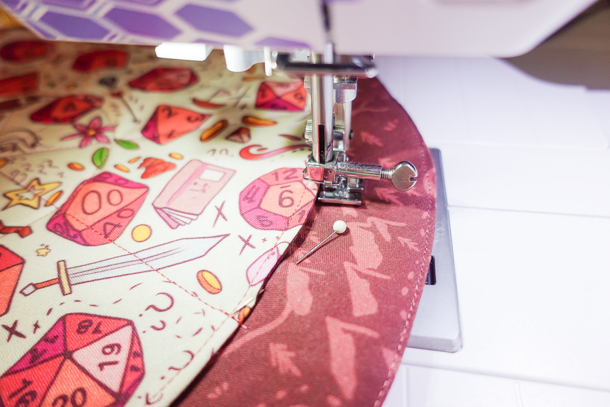 sewing the edge of a ribbon channel on the DND dice bag with the b79