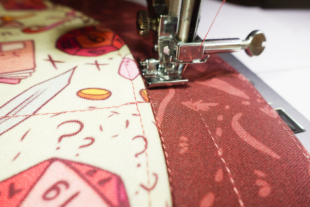 Closeup view of the stitching around the ribbon channel on colorful fabric