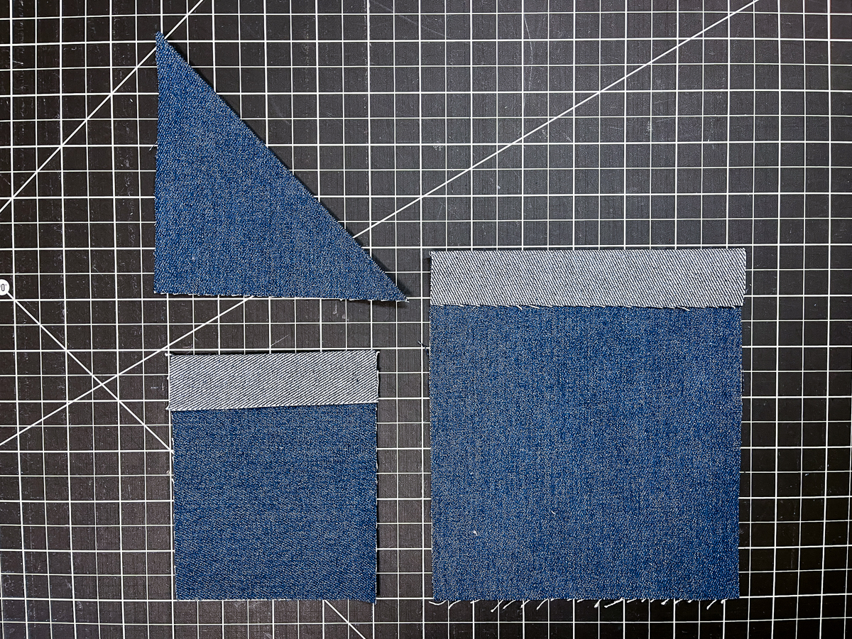 Blue denim on black cutting board after pressing