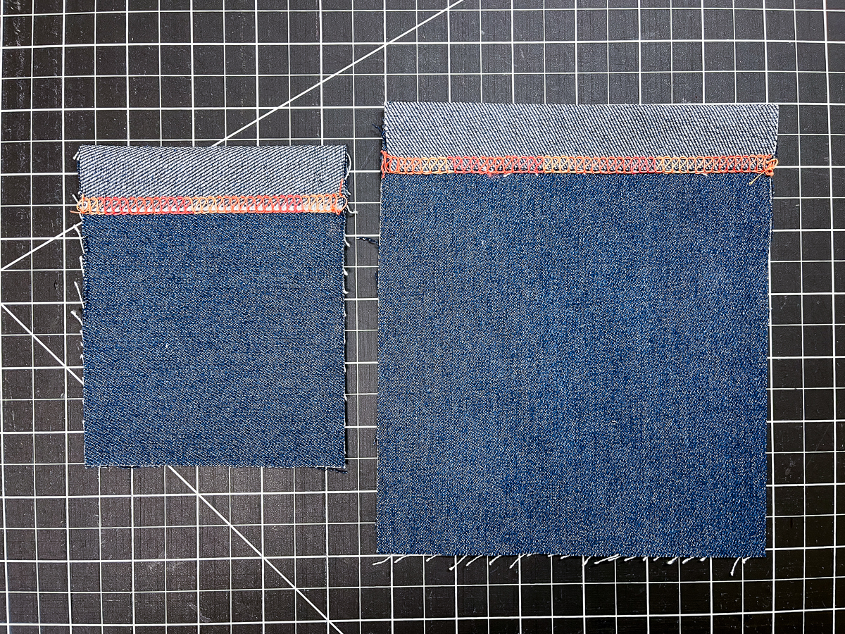 Two finished denim pockets laid flat