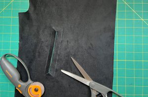 Clean cutting of a welt pocket opening.