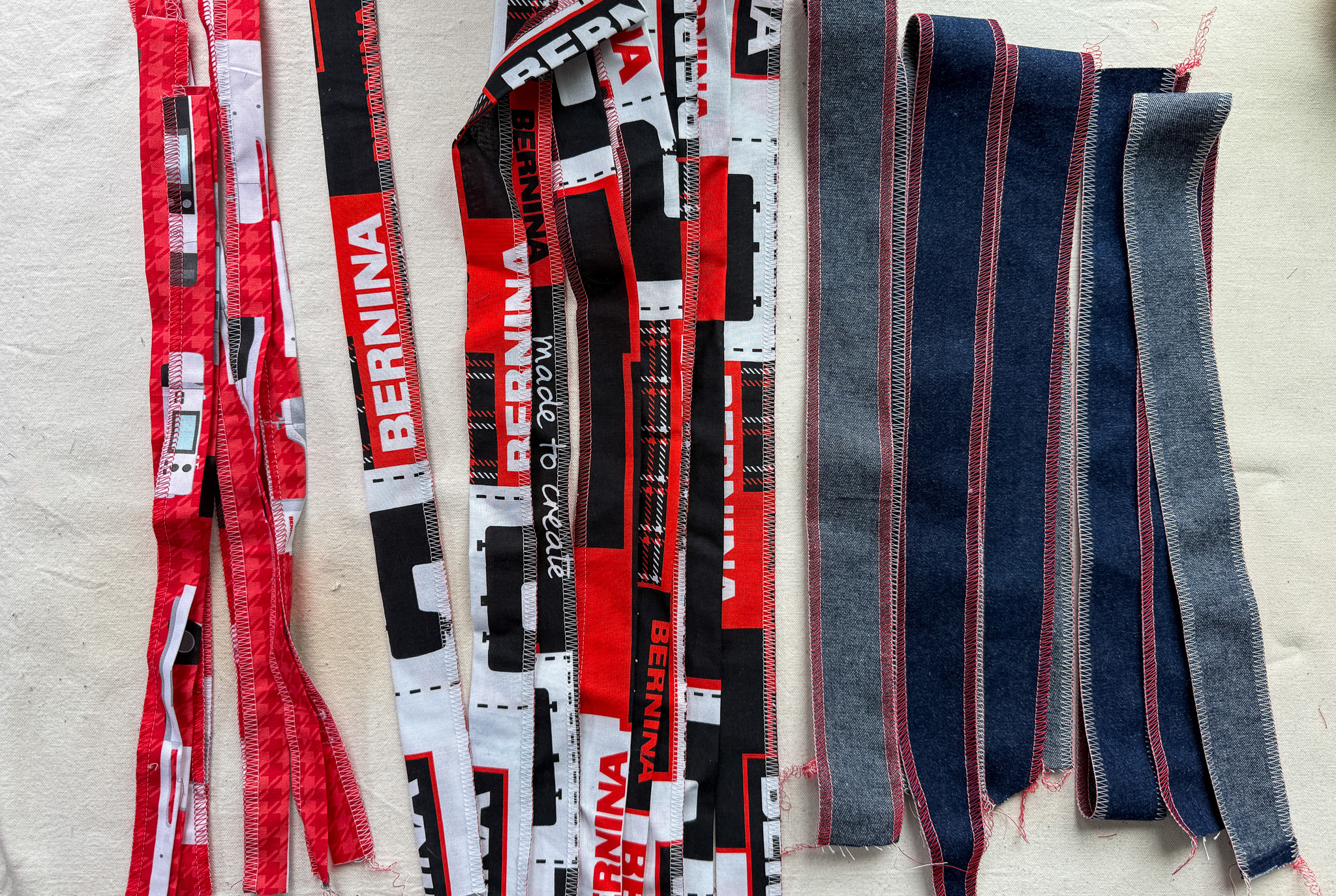 strips of fabric, some are denim and some are BERNINA quilting cotton