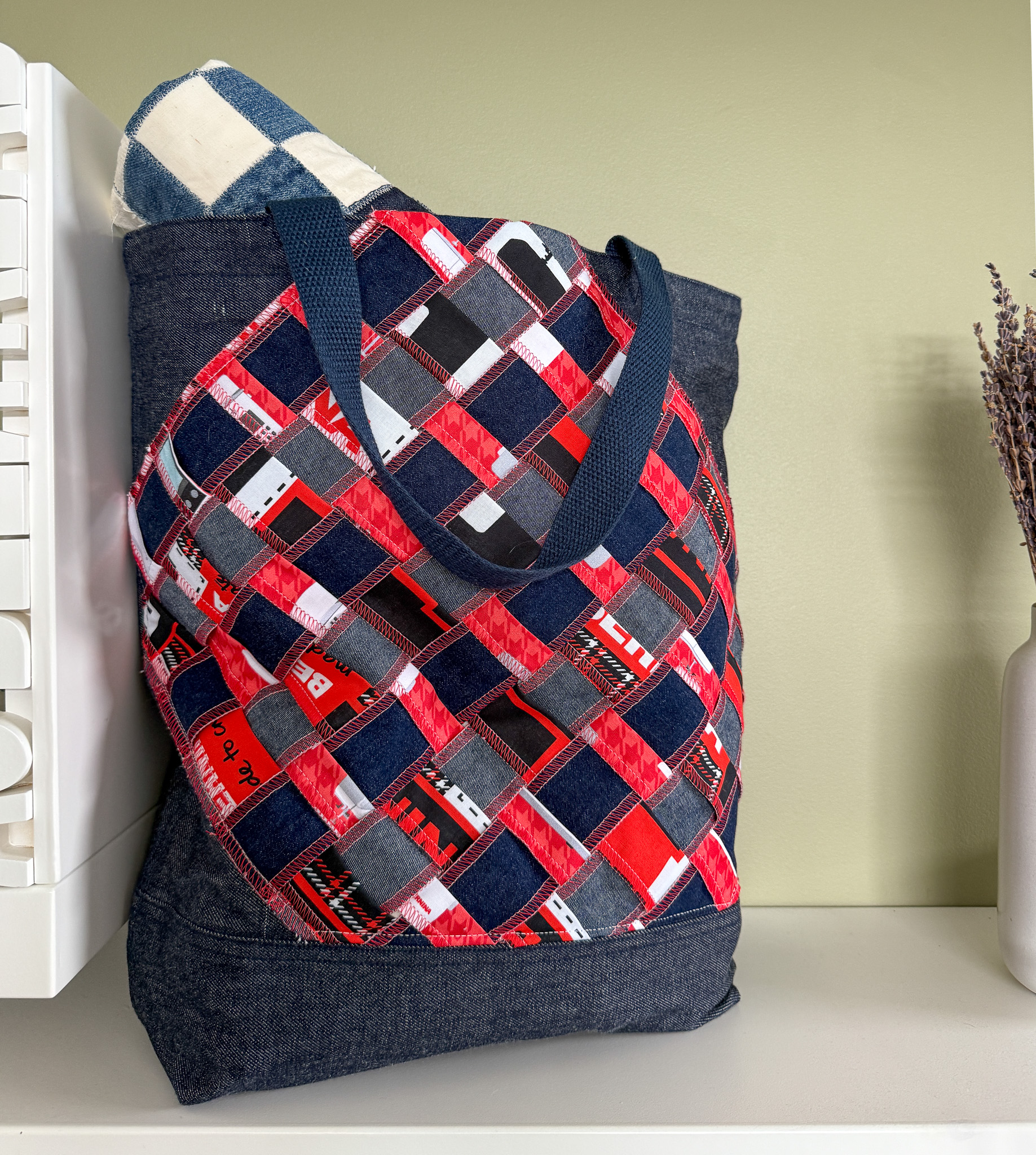 denim tote bag with a panel of woven BERNINA quilting cotton and denim strips.