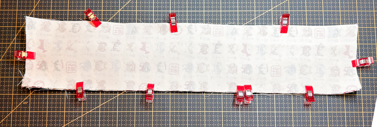 main fabric on wrong side with red clips