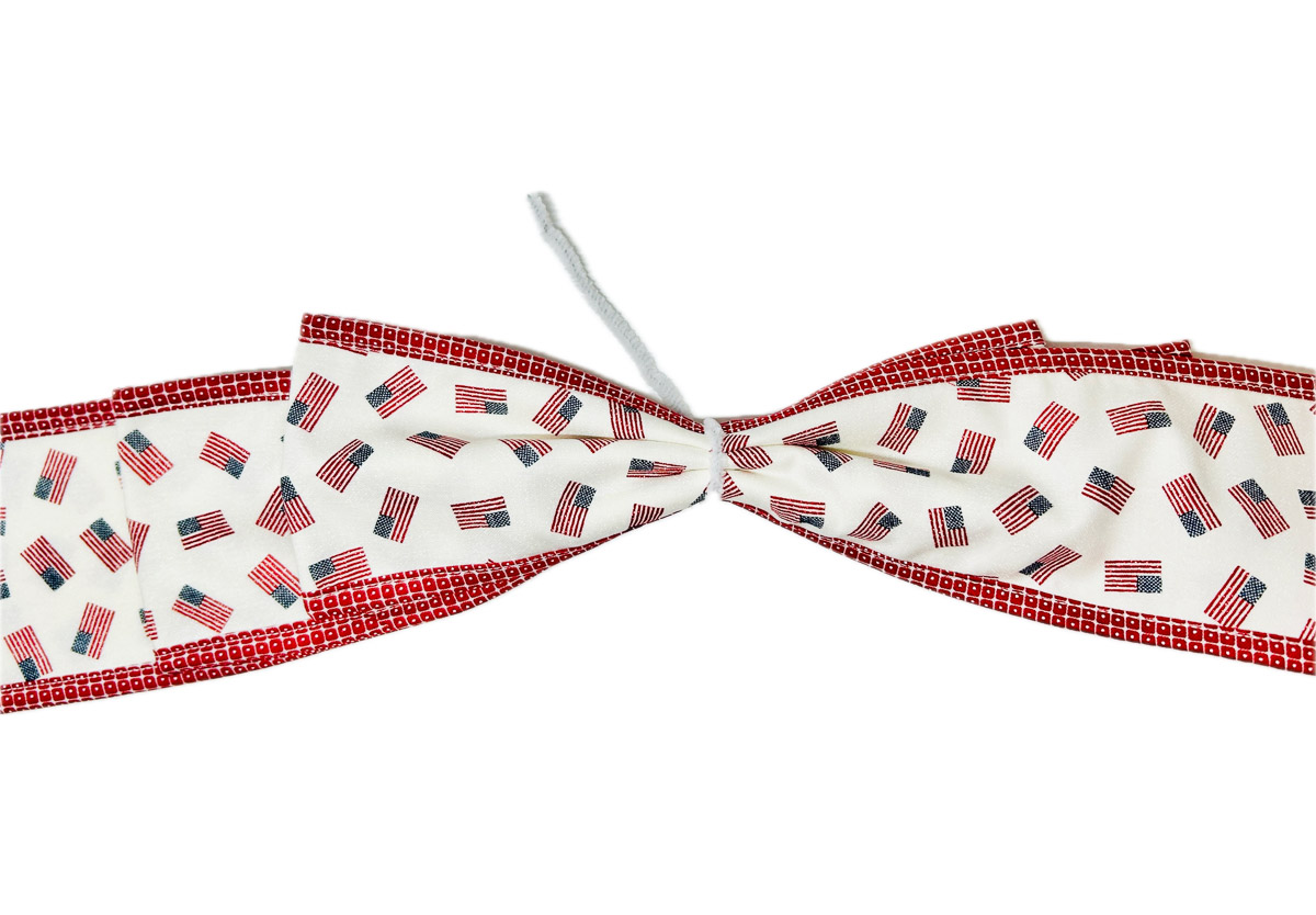 pipe cleaner wrapped around the center of a bow.