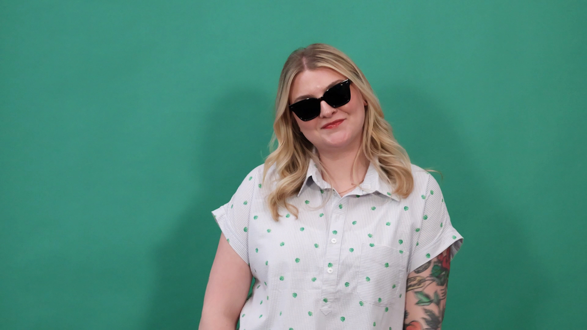 Bold, sassy blond wearing sunglasses and her me-made shirt with easy embroidered buttonholes
