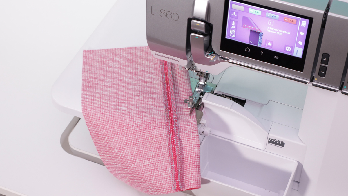 Serger with finished seam allowance