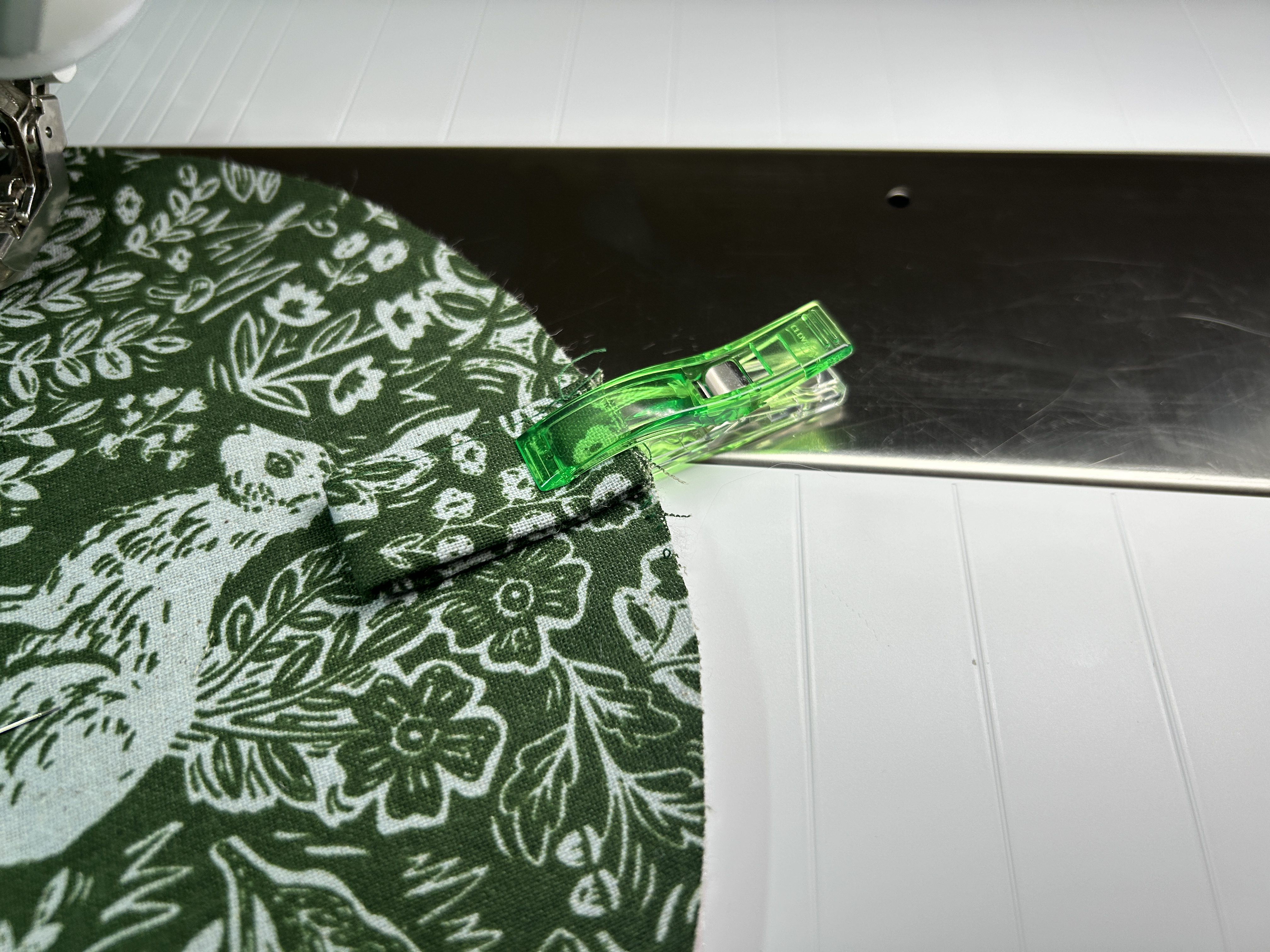 loop handle clipped to main fabric