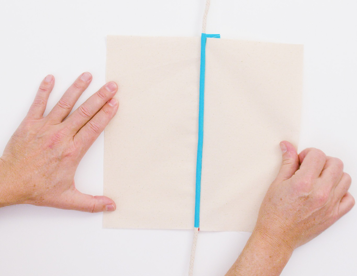 the finished results of cording piping the easy way, with blue and cream fabric