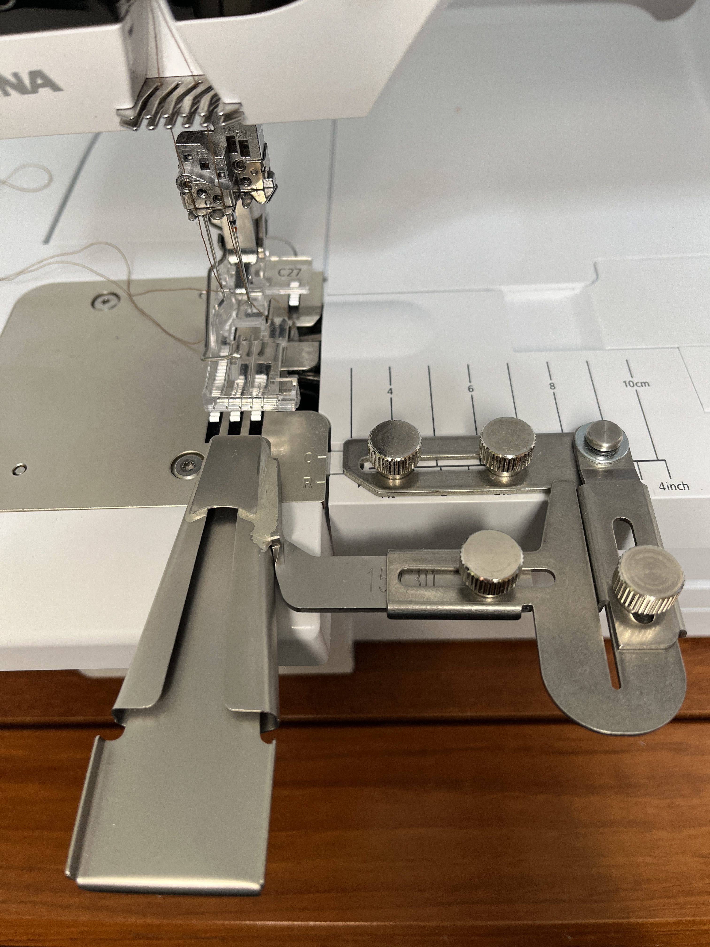 Belt loop folder on serger