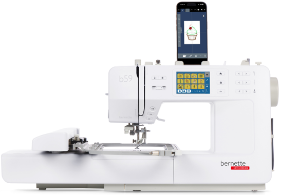 A compact sewing machine with embroidery module attached and smart phone, displaying embroidery design information, positioned on top