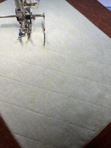 Green fabric with sewing