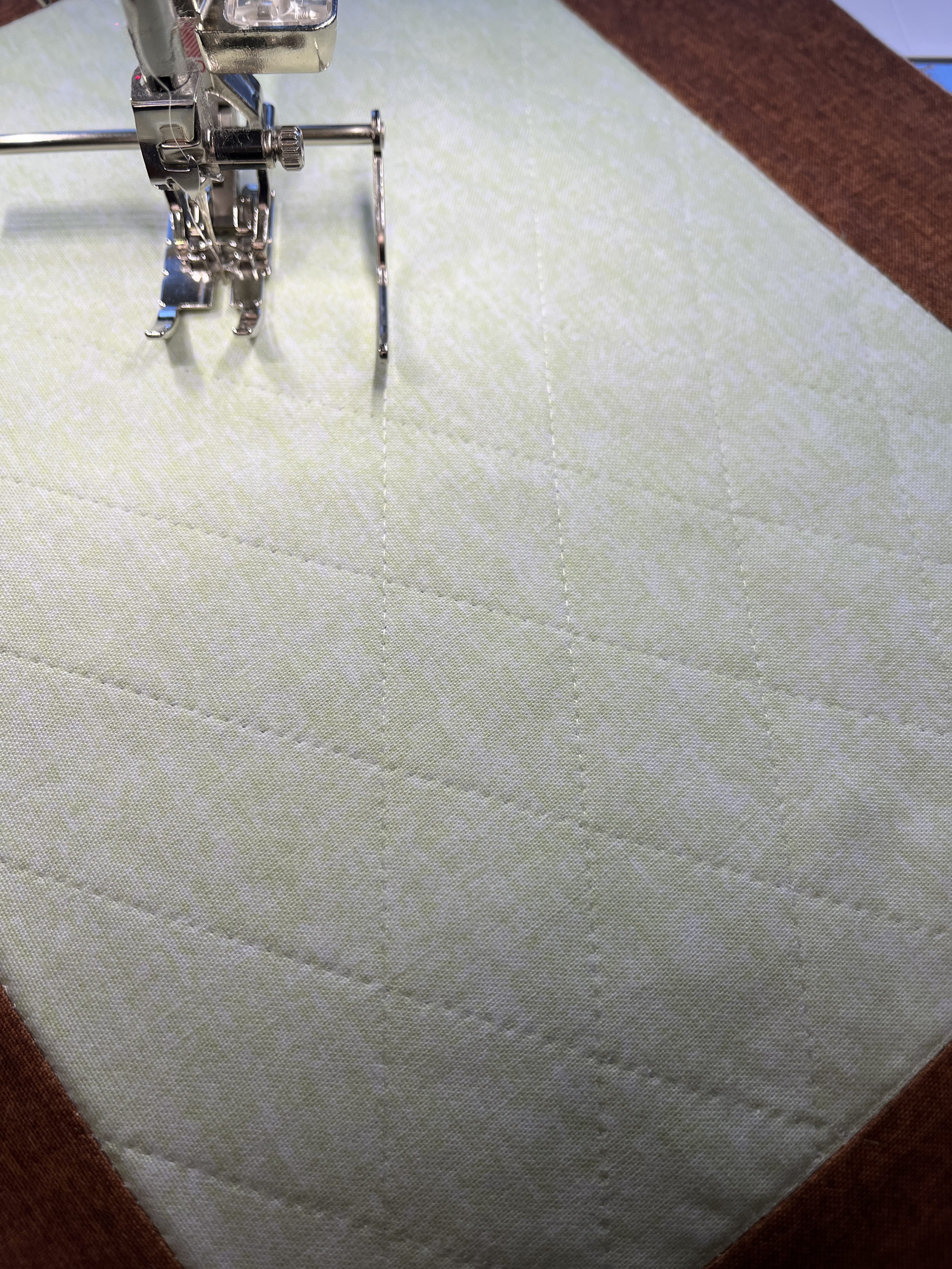 Green fabric with sewing