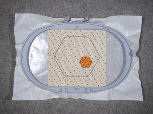 trim the hexagon fabric shape right up to the cutting stitch